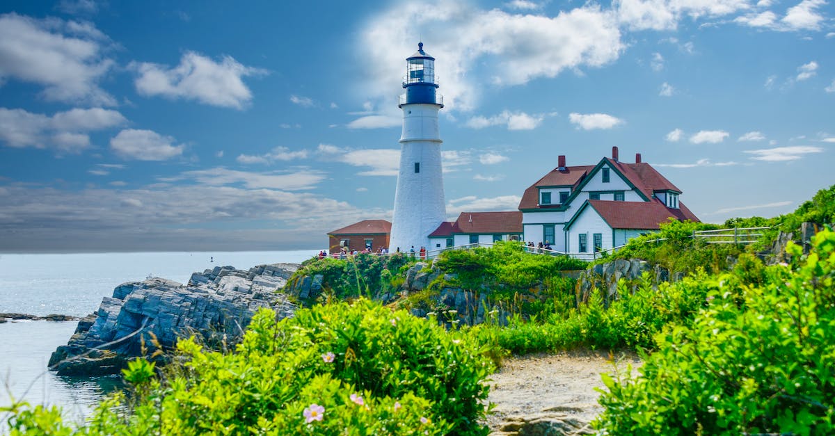 a-portland-head-light-near-the-green-trees-and-ocean-6917240