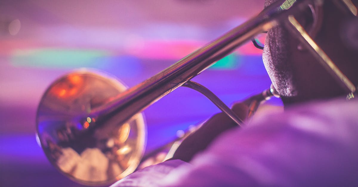 back-view-unrecognizable-professional-male-trumpet-player-performing-live-classical-music-during-con-1371796