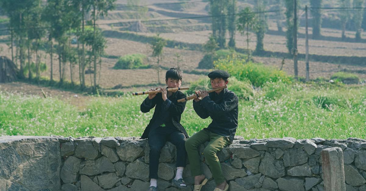 boys-playing-on-wooden-flutes-2316310