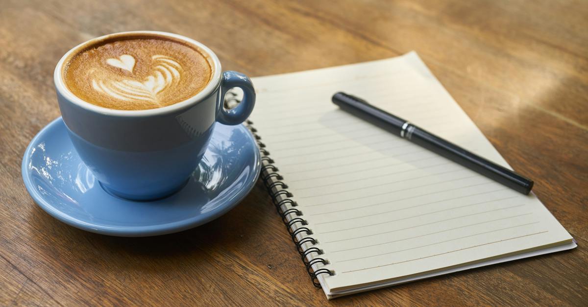 coffee-on-saucer-beside-the-notebook-3507870