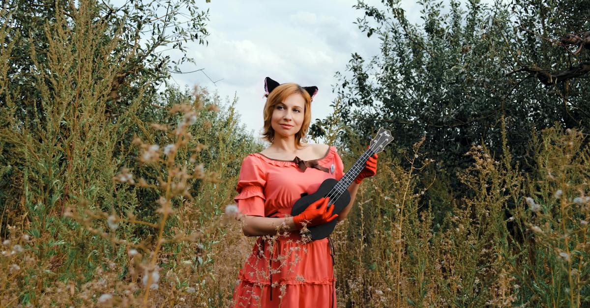 elegant-woman-with-ukulele-among-green-plants-8008454