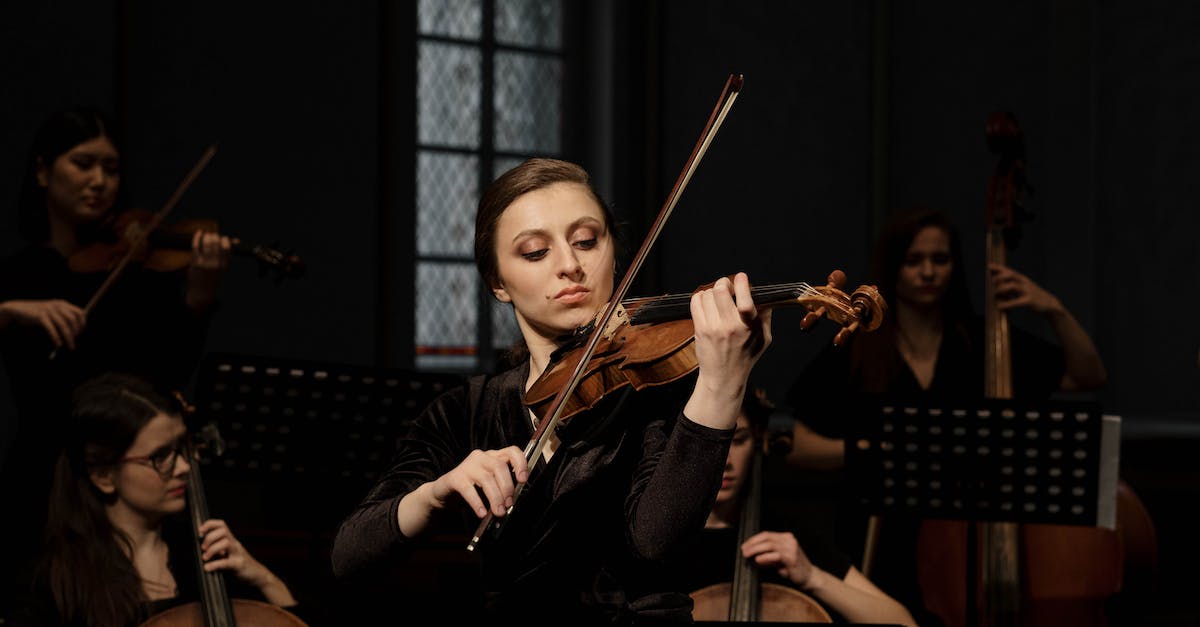 group-of-women-playing-musical-instruments-9444418