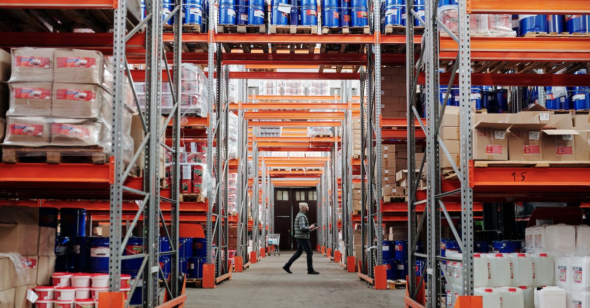 man-walking-in-warehouse-2357085
