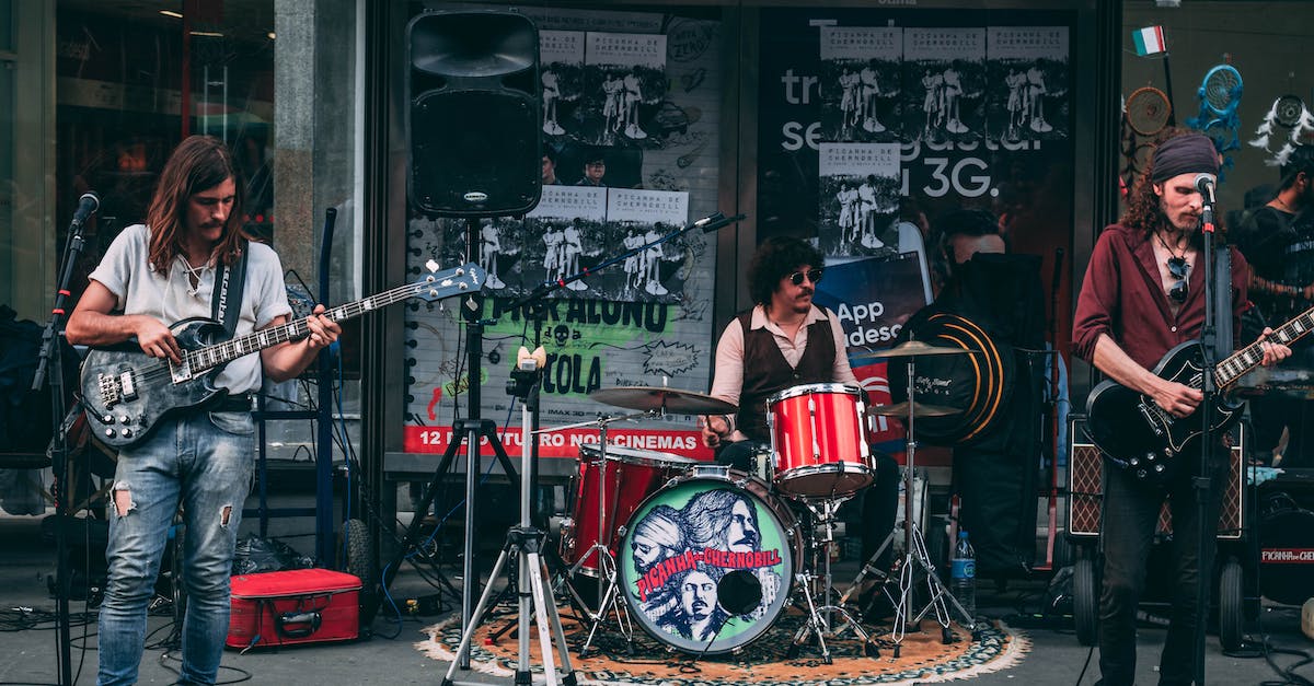 music-band-performing-in-front-of-building-4378727