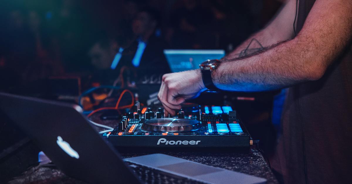 person-playing-dj-turntable-4846426