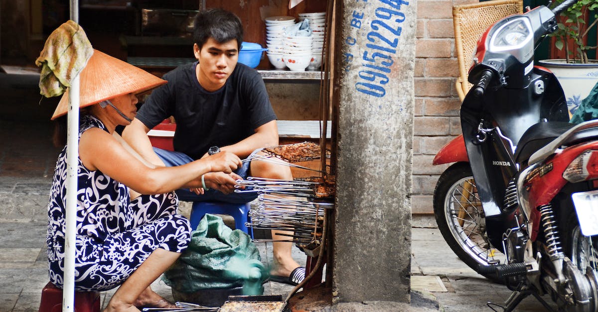 photography-of-man-and-woman-grilling-food-9637052