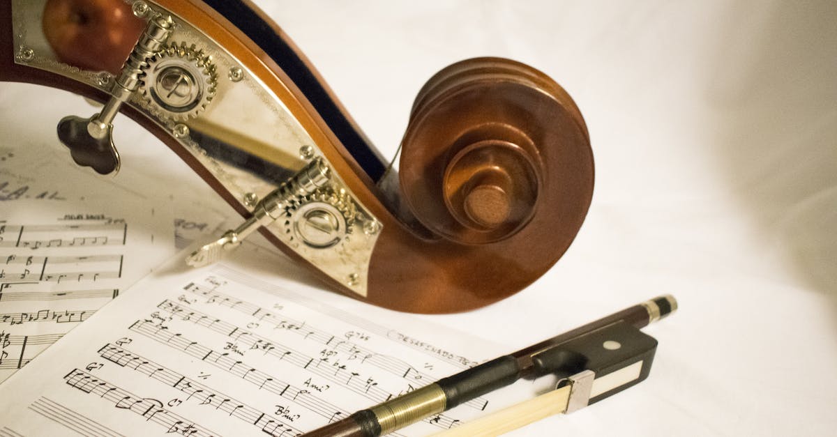 pile-of-music-notes-on-white-textile-1992634