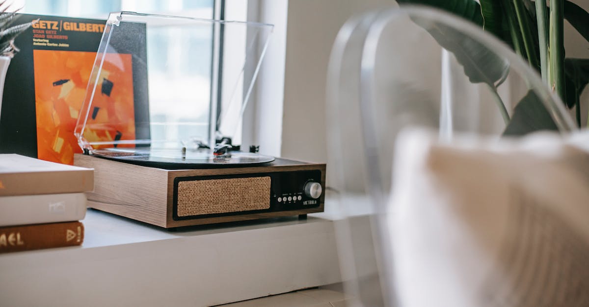 retro-record-player-on-windowsill-at-home-3688311