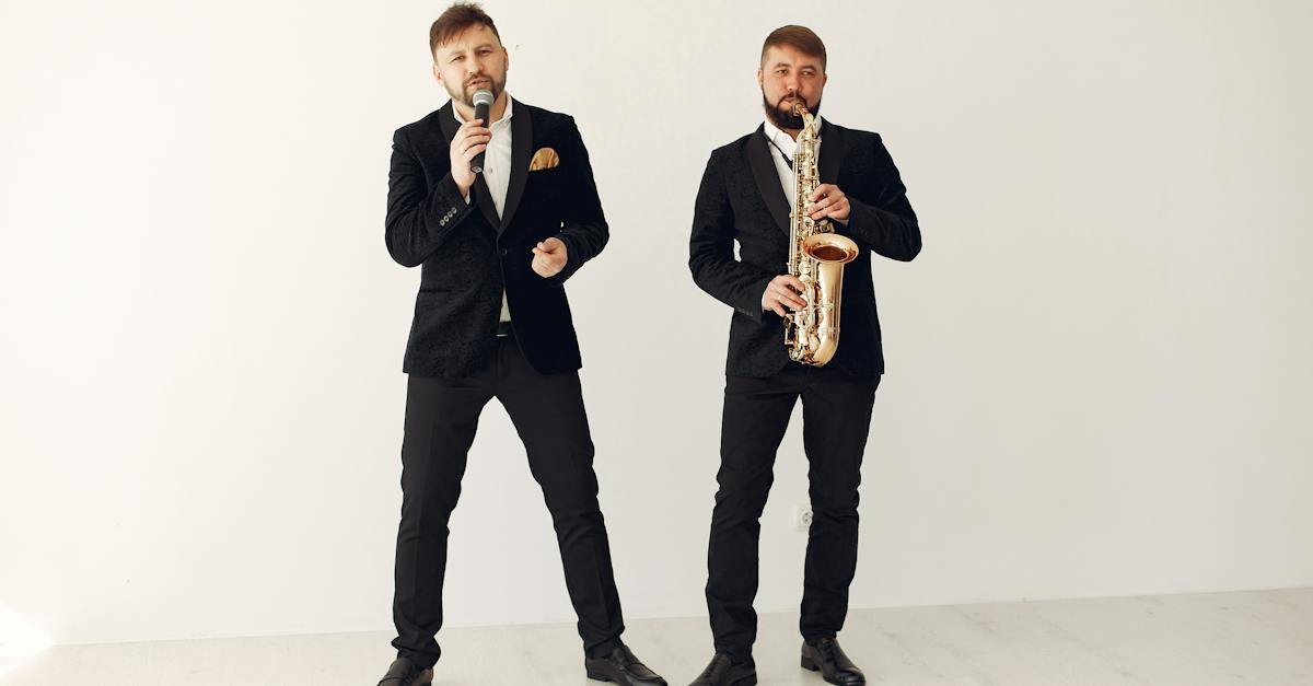 talented-male-artists-in-elegant-concert-suits-performing-with-saxophone-and-microphone-4431101