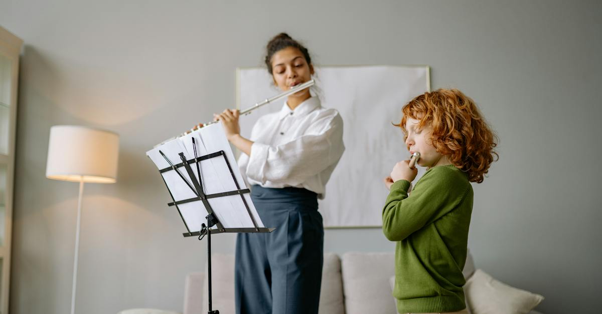 teacher-and-student-playing-flute-together-9795481