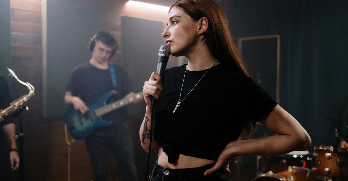 woman-in-black-t-shirt-singing-4276488