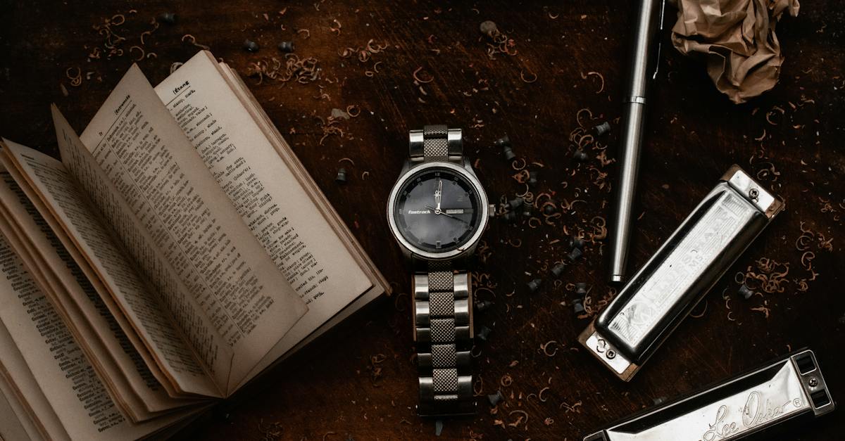 wristwatch-placed-near-open-book-4647919